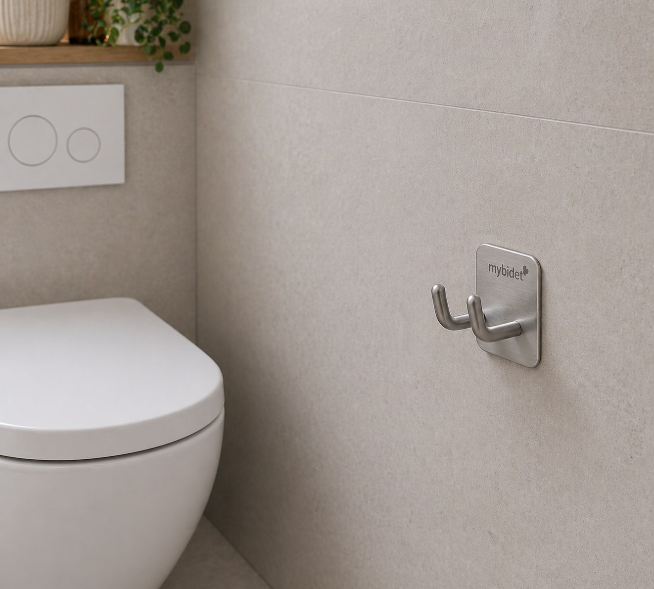 mybidet Edelstahl-Wandhalterung neben der Toilette